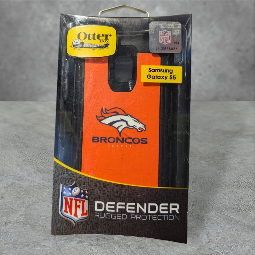 Y4. OtterBox Defender Samsung Galaxy S5 NFL Broncos (Missing Holster) See Descri